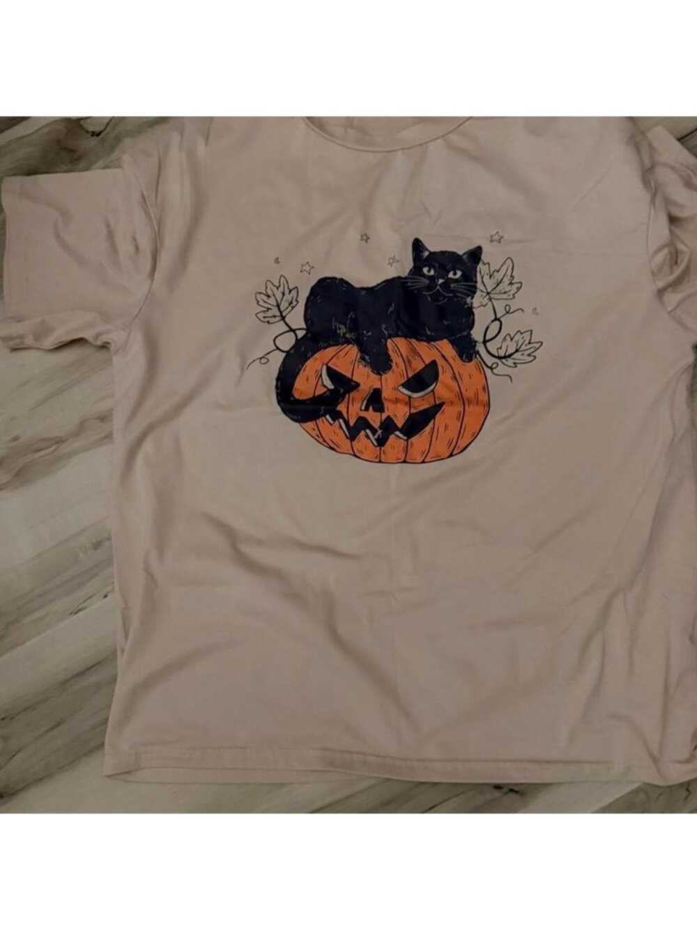 Black cat on pumpkin graphic tee